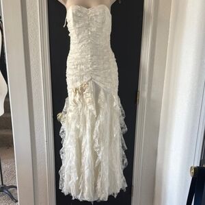 Betsy & Adam Ivory Lace Strapless Ruffled Mermaid Gown